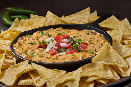 Deluxe Queso dip with Spicy Ground Beef, Jalapeno's and Tortilla Chips
