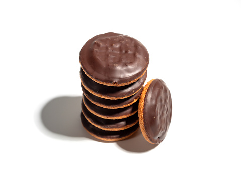 Cookies with dark chocolate and orange marmalade. Cookies with dark chocolate isolated on white background.