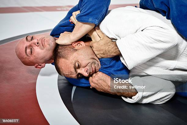 Jiujitsu Представление Проведения — стоковые фотографии и другие картинки Chokehold - Chokehold, Бразильское джиу-джитсу, Подавиться