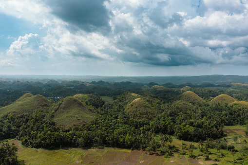 Beautiful mountains in the Philippines, called Chocolate Hills. Drone aerial view.