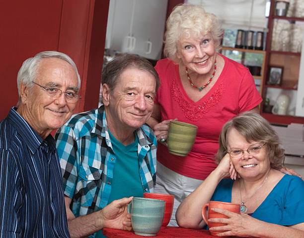 istock Four Smiling Friends in Bistro 164066578