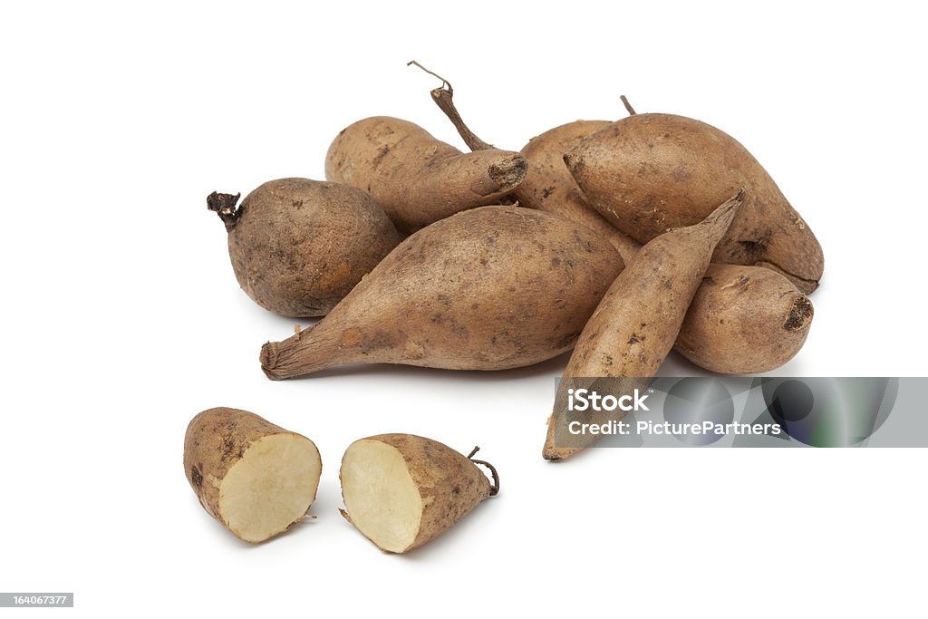 Fresh Yacon roots Fresh Yacon roots on white background Cross Section Stock Photo