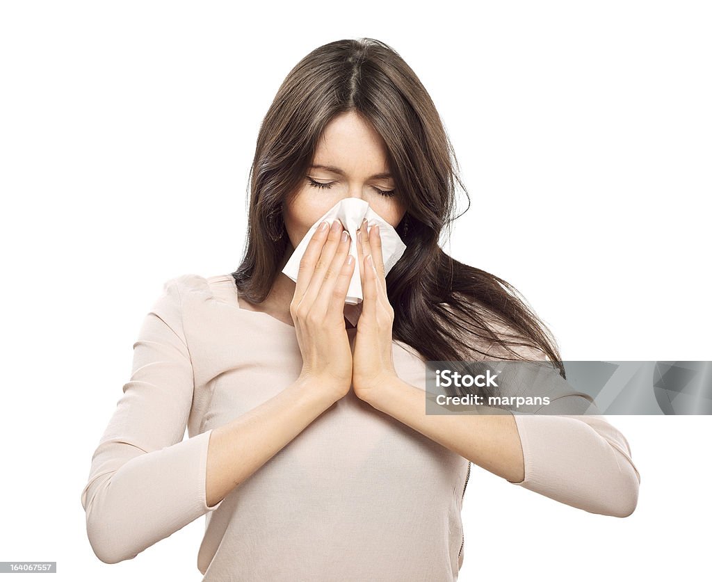 Woman with tissue catches a cold Adult Stock Photo