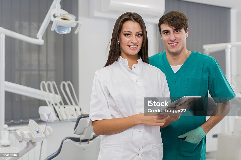 Dentist office Dentists with tablet in the dentist office Dental Assistant Stock Photo