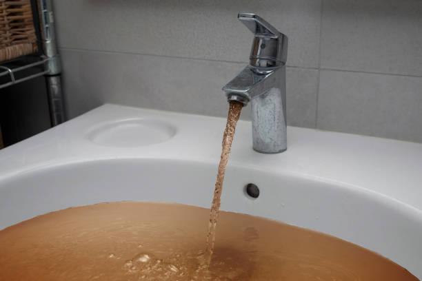istock Dirty brown tap water after floods 1640685045