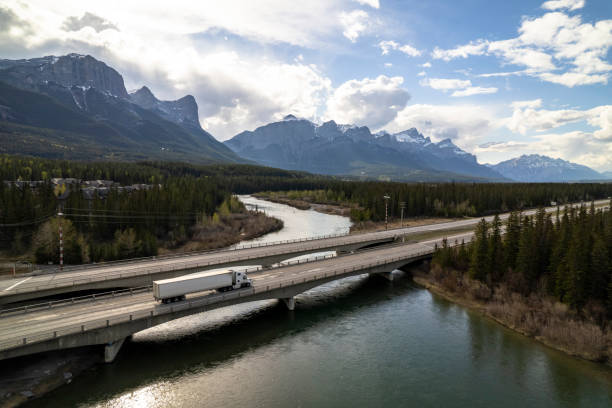 istock Transport truck on a scenic highway 1640685735