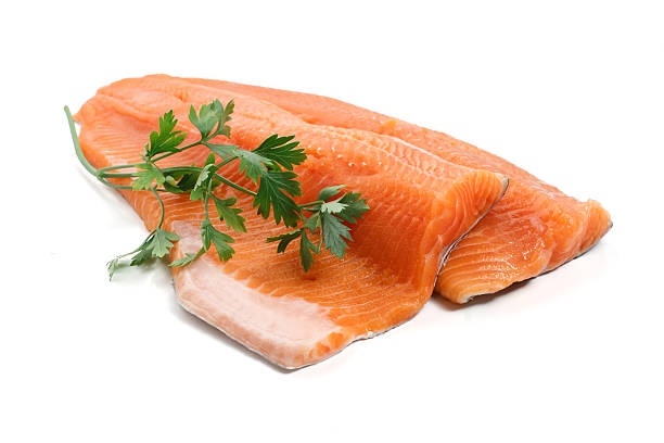trout fillet with parsley stock photo