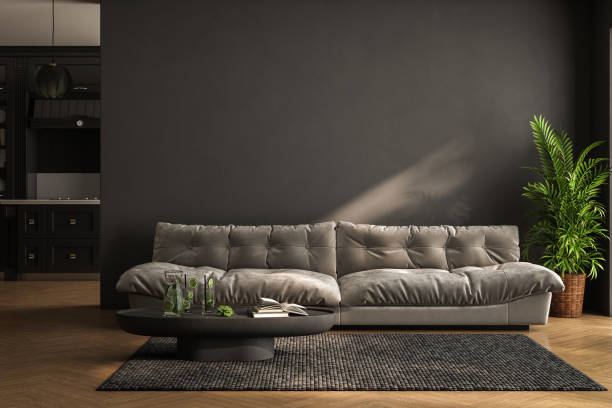 istock Modern interior design, kitchen and bright, spacious room with a comfortable sofa, plants and elegant accessories, black walls, parquet floor. 3d rendering 1640736357