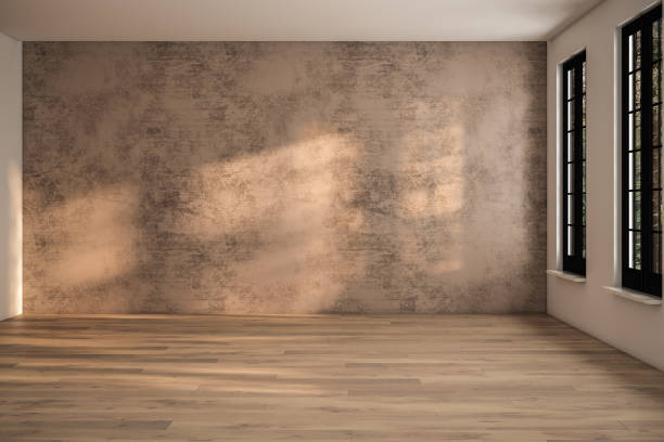 istock Empty room interior background, brown stucco wall, white wall, window and wooden floor 1640804535