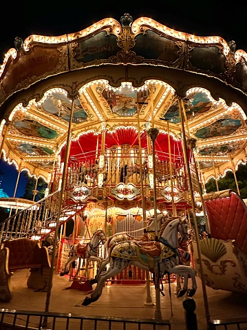 Picture of a golden carousel in Tivoli gardens, Copenhagen, Denmark