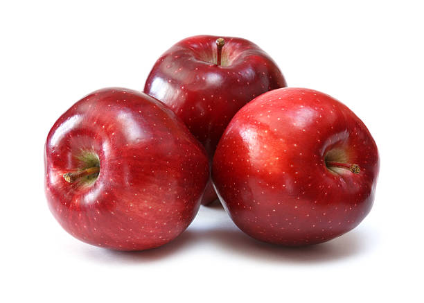 red apples red delicious apples over white background red delicious apple stock pictures, royalty-free photos & images