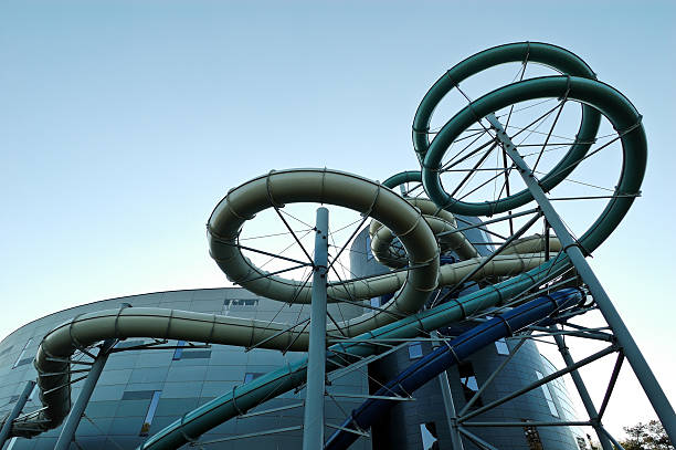 istock Waterslides coming out from the indoor amusement waterpark 164089217