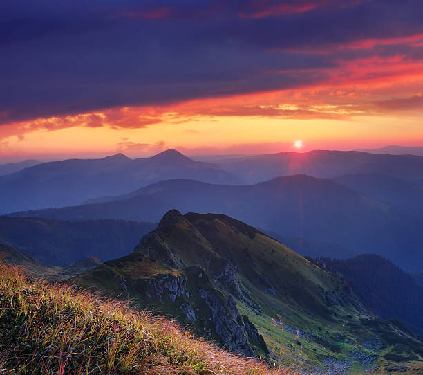istock Beautiful sunrise in the mountains 164089848