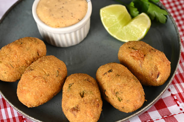 istock Fried codfish fritter typical Portuguese and Brazilian cuisine fish with herbs 1640917671