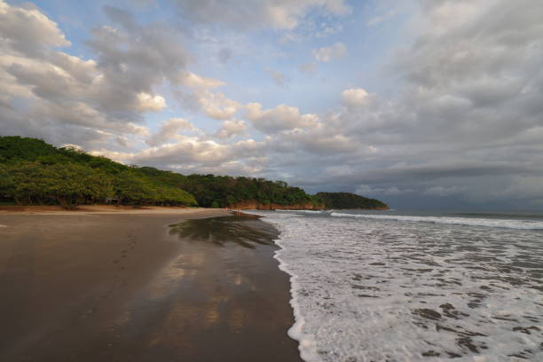 Sunset on Playa El Coco, Nicaragua. Sunset on beach at Playa El Coco on Nicaragua's Pacific coast. el coco stock pictures, royalty-free photos & images