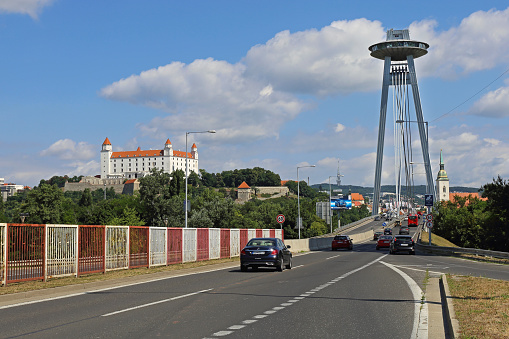 Bratislava, Slovakia - July 10, 2015: Famous SNP Bridge With UFO Restaurant on Top of Pylon in Capital City Summer Day.