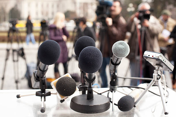 News conference Microphones at a news conference. Press conference. press room stock pictures, royalty-free photos & images