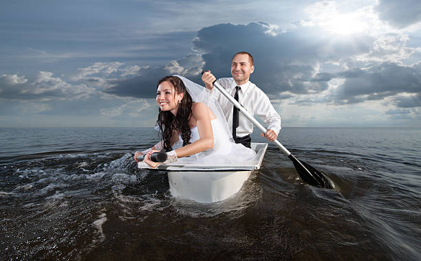 The bride and groom on their honeymoon stock photo