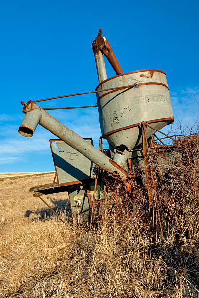 istock Antique combine forgotten by time 164104218