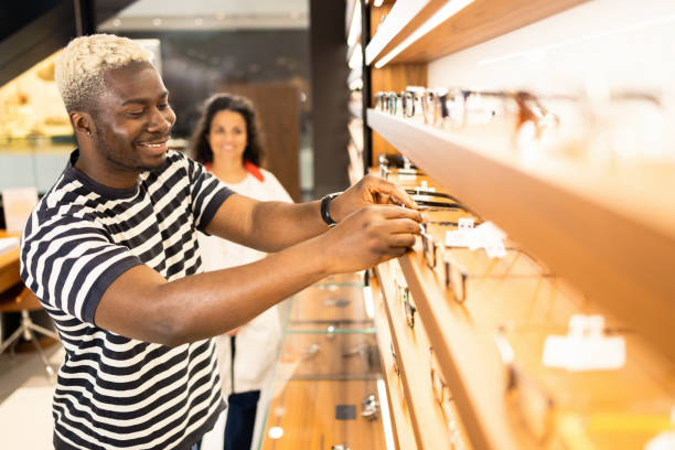 istock Young man in the ophthalmology store 1641053115