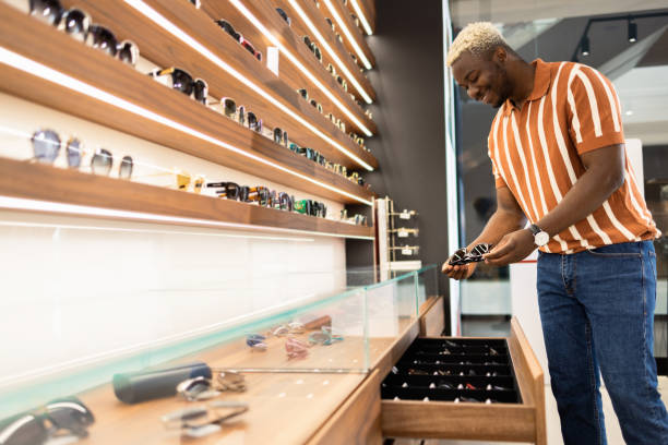 istock Young man in the ophthalmology store 1641057833