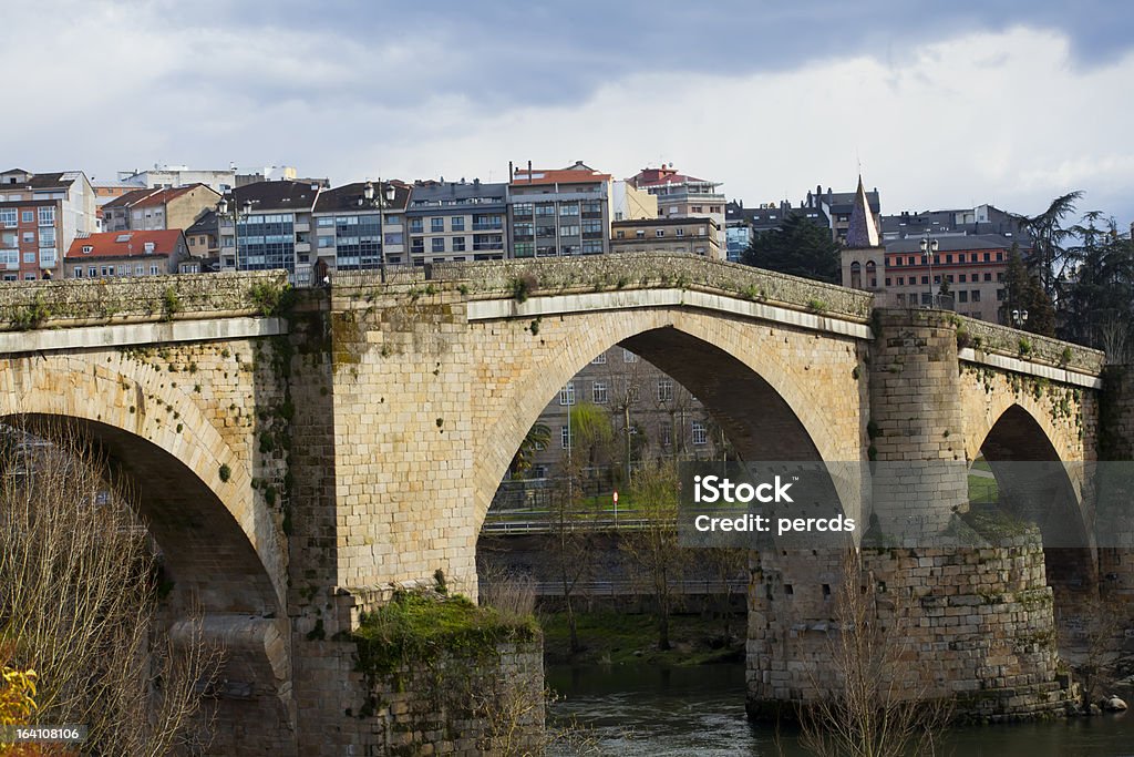 Римский мост в Оренсе (Испания) - Стоковые фото Мост роялти-фри