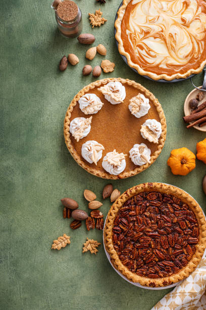 istock Traditional Thanksgiving pies with pumpkin pie in the middle 1641084336