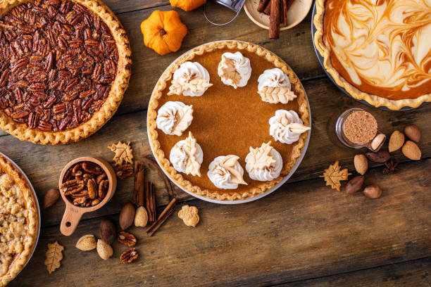 istock Traditional Thanksgiving pies with pumpkin pie in the middle 1641084347