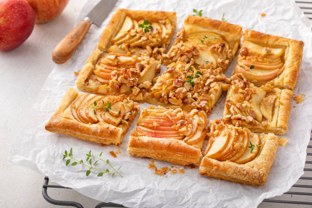 istock Cinnamon apple and pecan galette, fall dessert on puff pastry 1641085953