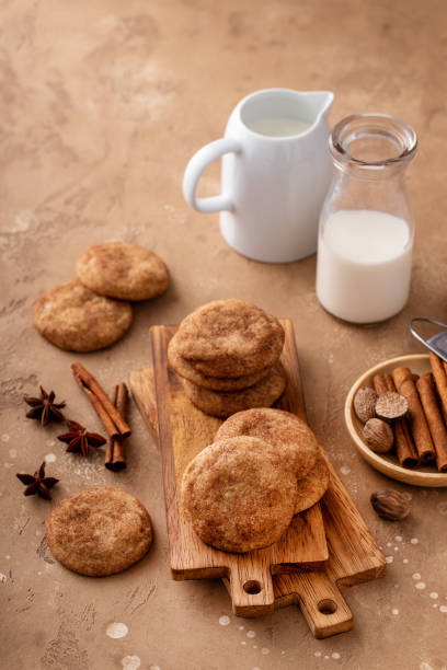 istock Cinnamon cookies on wooden board with milk 1641096879