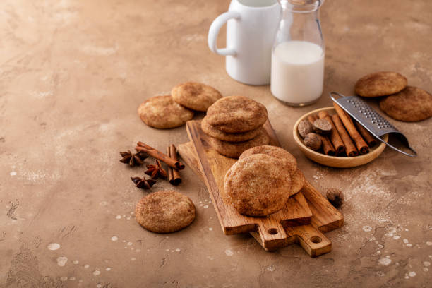 istock Cinnamon cookies on wooden board with milk 1641096882