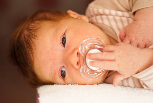 istock Beautiful three weeks age newborn boy 164111298