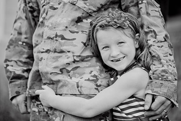 Soldier and Daughter stock photo