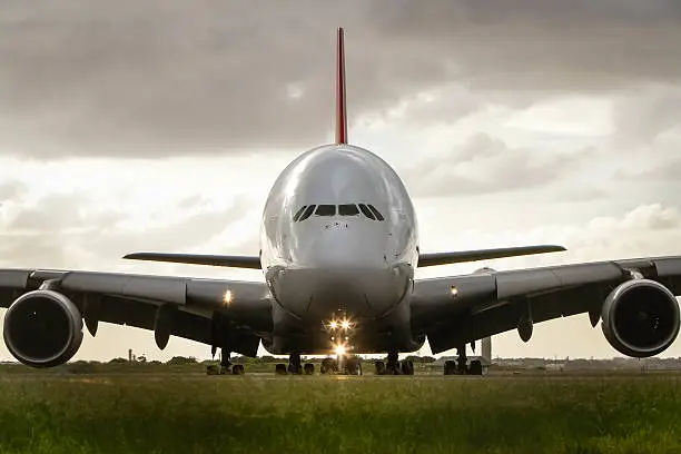 Photo of Airbus A380 airliner under cloudy skies