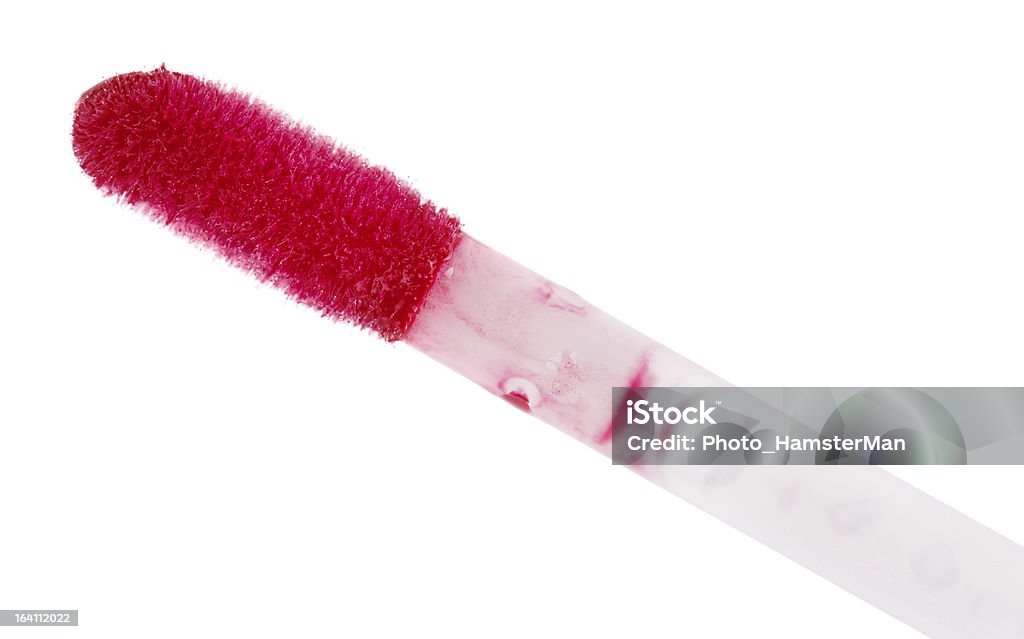 Liquide rouge Pinceau à lèvres brillant, isolé sur fond blanc - Photo de Au bord de libre de droits