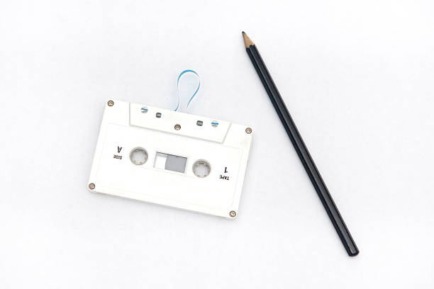 Use a pencil to unwind an audio cassette tape --- Old and obsolete technology