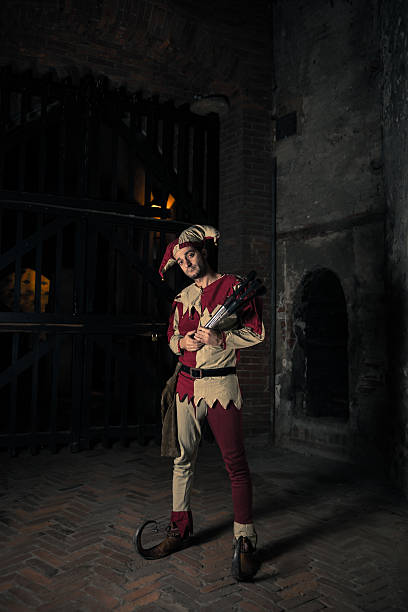 istock Street Performer Jester with Torch 164114487