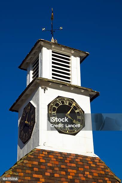 Foto de Torre Do Relógio e mais fotos de stock de Aldeia - Aldeia, Alto - Descrição Geral, Cata-vento