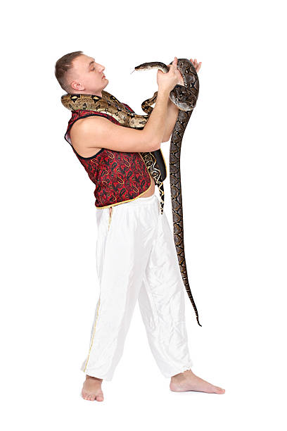 istock Young Caucasian man with snakes 164115224
