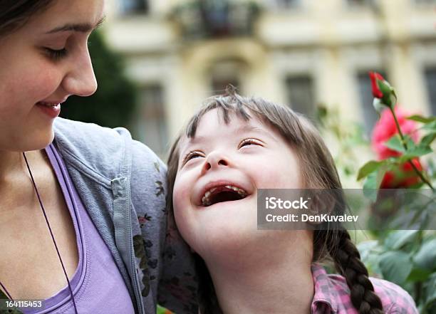 Happy Family Moments Stock Photo - Download Image Now - Down Syndrome, Adult, Beautiful People