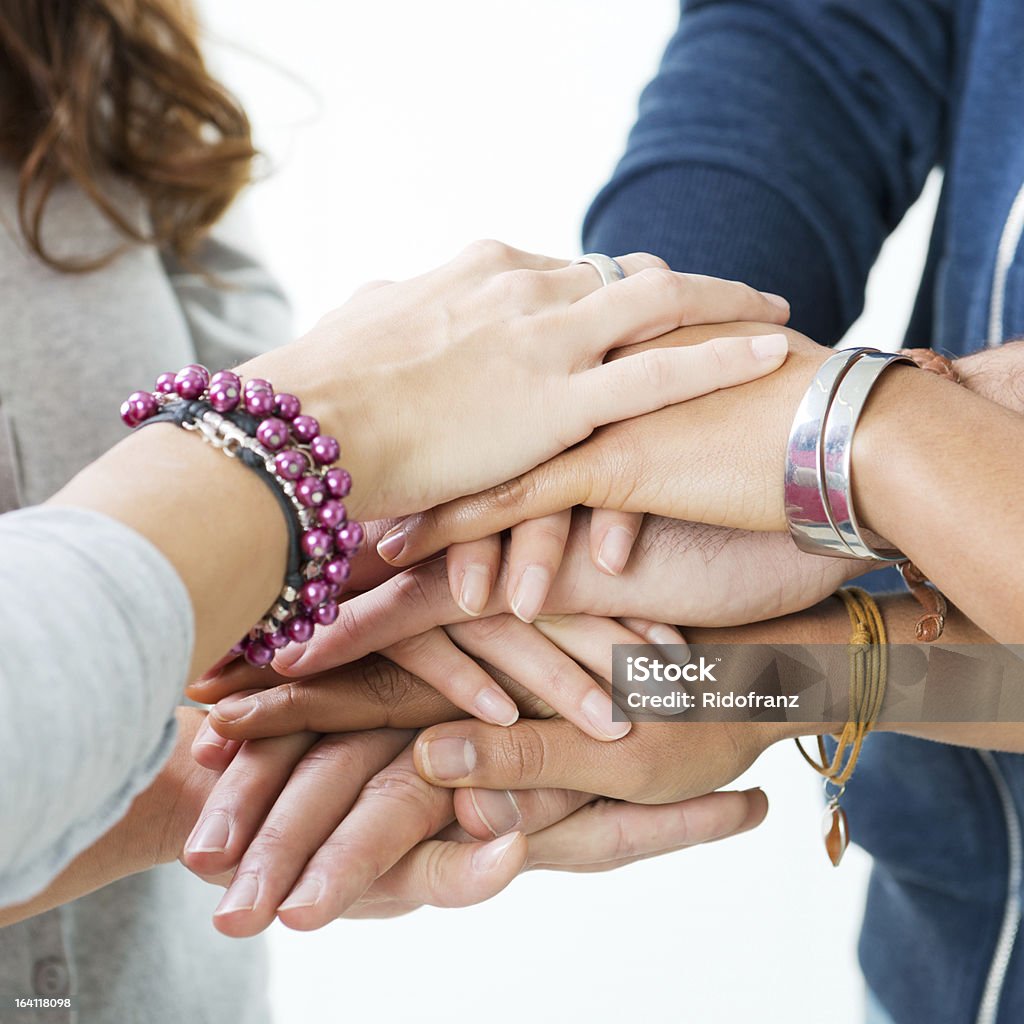 Stack of Hands Group Of Teens Stacking Their Hands, Unity and Solidarity. 16-17 Years Stock Photo