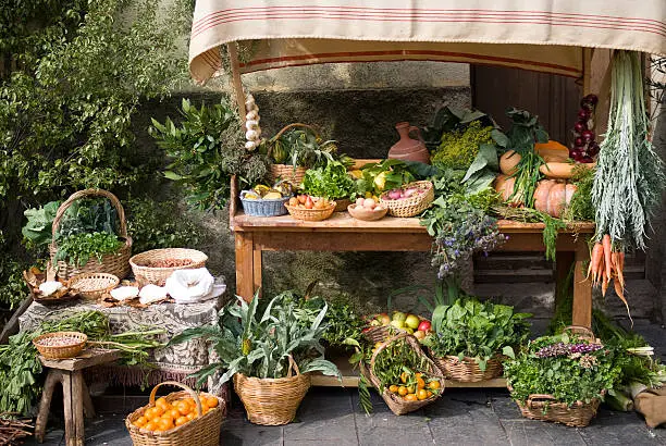 Fruit and vegetable stall at  a medieval market
