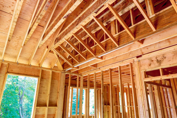 istock New house interior unfinished construction with wooden framing beams 1641237162