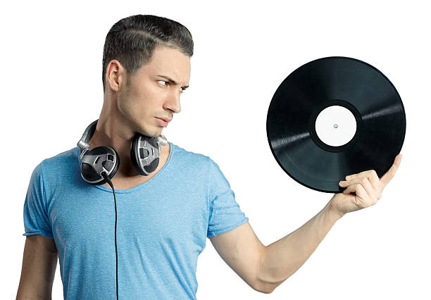 istock Young male holding black vinyl in hand 164126009
