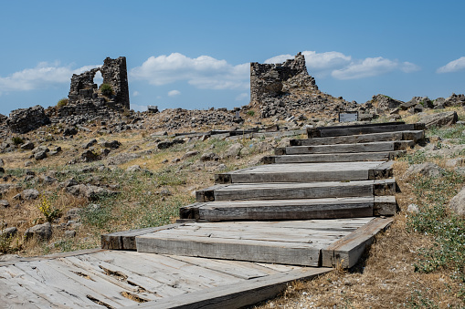 Located in the Bakırçay Basin, north of Izmir, Bergama is one of the most important settlements in the history of civilization and was founded on the ancient city of Pergamon. Although the history of the region dates back to the Bronze Age, the earliest finds on the top of the castle where the ancient city of Pergamon was founded date back to the 7th to 6th centuries BC.

The city came to the forefront during the Hellenistic Period and served as the capital of the Kingdom of Pergamon, which was established during this period. There are many civil architecture examples such as mosques, inns, baths, fountains, synagogues, synagogues, covered bazaars, etc. bearing the traces of Hellenistic, Roman, Byzantine, Seljuk and Ottoman periods. The city, which smells of history, is an open-air museum like many districts of Izmir and is one of the richest districts of Izmir in terms of culture.