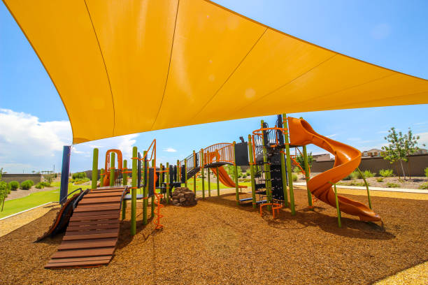 istock Covered Children's Playground Equipment In Public Park 1641287274