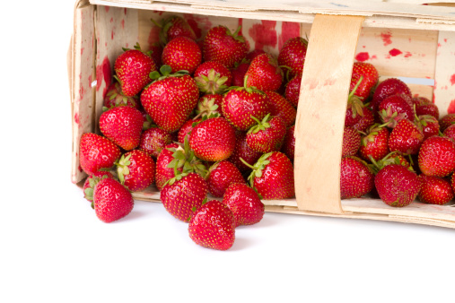 fresh strawberries in wooden basket