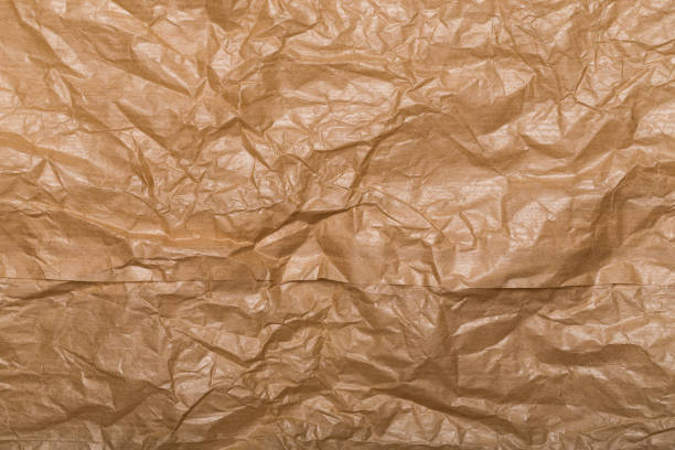 istock Torn grunge brown paper background texture, asset for graphic design 1641413693