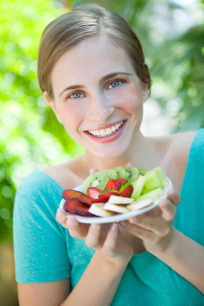 istock Woman with Fruits 164142613