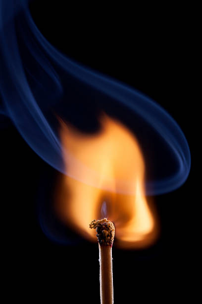 istock Ignition of a match, with smoke on dark background 164144171